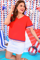 Feel confident and stylish in our Patriotic Waves Ric Rac Top! This top features chic blue and white ric rac detailing and a flattering v-neckline on both the front and back. Perfect for any occasion, show off your patriotism and fashion sense with this must-have top.
