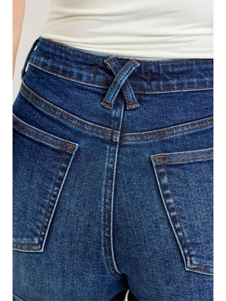 Flattering, comfortable, and made for your best warm-weather days. The Judy Blue High-Rise Tummy Control Shorts in medium wash combine a classic, versatile medium wash denim finish with a high waist, slim fit, and built-in tummy control for a polished, confidence-boosting silhouette that works effortlessly from everyday errands to summer celebrations. Crafted from a 94% Cotton / 5% Polyester / 1% Spandex blend, they offer just enough stretch for all-day comfort without sacrificing structure or shape.