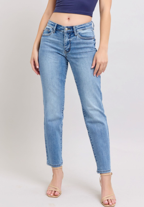 Judy Blue mid-rise vintage wash slim jeans featuring a cell phone pocket, non-destroy design, and versatile cuffed or uncuffed styling for a timeless look.