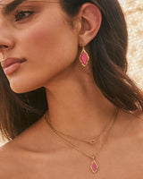 Mini Elisa Vintage Gold Pendant Necklace in dark fuchsia magnesite

Dainty fuchsia stone pendant necklace with satellite chain

Kendra Scott Mini Elisa necklace with pink magnesite stone

Vintage gold short pendant necklace with adjustable chain

Minimal dainty gold necklace with fuchsia teardrop pendant
