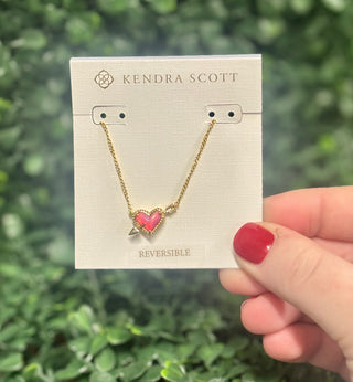 Kendra Scott Ari Heart Gold Arrow Necklace in Pink Opalescent Resin
Kendra Scott Necklace 
Reversible Necklace 
Valentines Necklace 
Trendy Jewelry