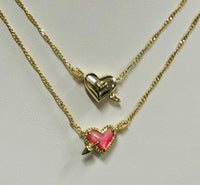 Kendra Scott Ari Heart Gold Arrow Necklace in Pink Opalescent Resin
Kendra Scott Necklace 
Reversible Necklace 
Valentines Necklace 
Trendy Jewelry
