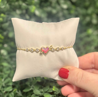Ari Heart Gold Arrow Tennis Bracelet in Pink Opalescent Resin
Kendra Scott Bracelet 
Heart Bracelet 
tennis bracelet 
Valentines jewelry 
Trendy 
Kendra Scott
