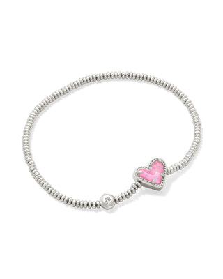 Metal | Rhodium plated over brass
Stone | Pink iridescent glitter glass
Station | 0.43"L x 0.37"W heart station
Size | 6.5" unstretched circumference
Fit | Stretch design fits any wrist
Note | Due to the one-of-a-kind nature of the medium, exact colors and patterns may vary slightly from the image shown.
Collection | Kendra Scott Ari
