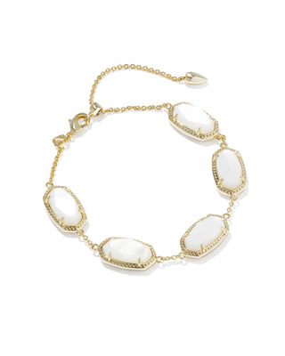 Brand | Kendra Scott
Style | Link Bracelet
Design | Series of signature oval-shaped stones linked together for a sculptural, eye-catching silhouette
Material | Ivory Mother of Pearl
Metal | 14k Yellow Gold Over Brass
Closure | Lobster clasp with a single adjustable slider bead
Size | 6.5" L, 0.38" W with 1.5" extender