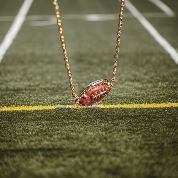 Kendra Scott Necklace 
Kendra Scott Sports Collection 
Kendra Scott Football