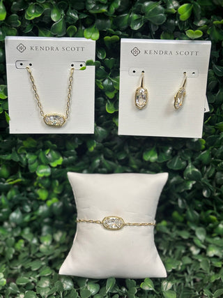 Kendra Scott Gold in white crystal set bracelet necklace and earring