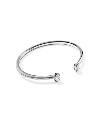 Style | Dainty Mini Elton pinch cuff
Colorway | Silver in White Crystal
Stone | Custom-cut cubic zirconia in Kendra Scott’s bestselling shape
Detail | Signature hoofprint detailing
Inner Diameter | 2.28 inches
Stations | 0.36 inches long x 0.24 inches wide
Brand | Kendra Scott