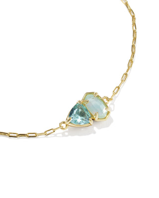 Style | Delicate Chain Bracelet
Design | Signature Elisa shape with a trillion-cut stone in March birthstone-inspired shades, a toi et moi ("you and me") style
Colorway | Light Blue Mix
Metal | 14k Yellow Gold Over Brass
Closure | Lobster clasp with a single adjustable slider bead
Size | 8" inner circumference, 0.36" wide