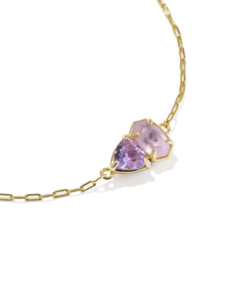 Style | Delicate Chain Bracelet
Design | Signature Elisa shape with a trillion-cut stone in February birthstone-inspired shades, a toi et moi ("you and me") style
Colorway | Purple Mix
Metal | 14k Yellow Gold Over Brass
Material | Purple Amethyst and Violet Crystal
Closure | Lobster clasp with a single adjustable slider bead
Size | 8" inner circumference, 0.36" wide