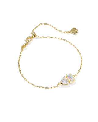 Style | Delicate Chain Bracelet
Design | Signature Elisa shape with a trillion-cut stone in April birthstone-inspired shades, a toi et moi ("you and me") style
Colorway | White Crystal Mix
Metal | 14k Yellow Gold Over Brass
Material | Dichroic Glass and White CZ
Closure | Lobster clasp with a single adjustable slider bead
Size | 8" inner circumference, 0.36" wide
