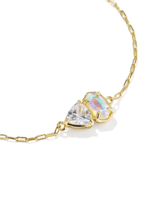 Style | Delicate Chain Bracelet
Design | Signature Elisa shape with a trillion-cut stone in April birthstone-inspired shades, a toi et moi ("you and me") style
Colorway | White Crystal Mix
Metal | 14k Yellow Gold Over Brass
Material | Dichroic Glass and White CZ
Closure | Lobster clasp with a single adjustable slider bead
Size | 8" inner circumference, 0.36" wide