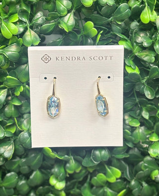 Lee Luxe Drop Earrings Gold Light Blue with oval cubic zirconia stone in gold basket setting.