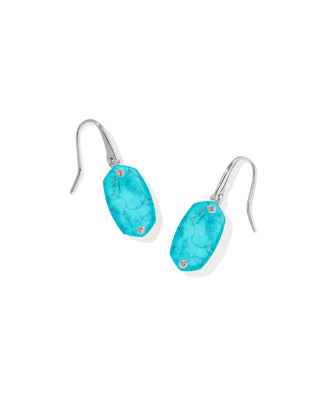 Style | Drop earrings
Finish | Silver
Stone | Variegated Turquoise
Setting | Riveted stone with hammered metal back, frameless finish
Dimensions | 1.19" L × 0.38" W
Brand | Kendra Scott