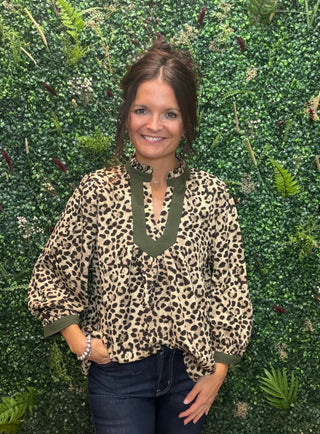 beige and black leopard print blouse with olive green trim
