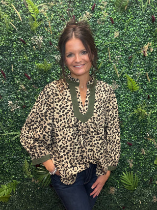 beige and black leopard print blouse with olive green trim