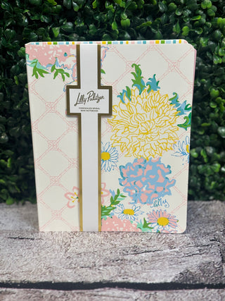 Have a lot to say and no place to put it? With 160 college-ruled pages, this mini notebook in Lilly Garden Home gives you space to share your dreams, keep track of your travels, or even jot down grocery lists. And it's all held within a concealed spiral book splashed with a bright, sunny Lilly print.