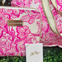 Perfect for vacations, weekend getaways, or everyday errands, this tote combines Lilly’s iconic Unforgettable Pink print with smart design for effortless travel. Toss it in your suitcase, carry-on, or car, and always have room for more.