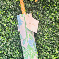Let every rainy day feel like a walk by the shore with our travel umbrella, designed to bring coastal charm wherever the weather takes you. The sleek hydrangea blue canopy offers classic elegance, while the inside reveals our signature Swayin’ in the Breeze pattern. A bamboo-textured hook handle adds a natural, beachy touch, blending beauty and function in every detail. Whether protecting yourself from the sun or showers, this umbrella will help you do it in style.
