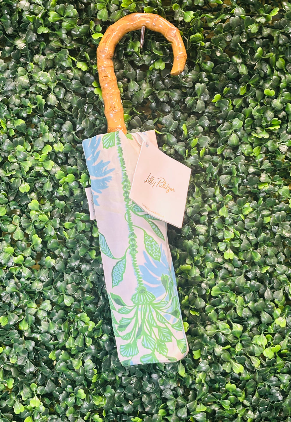 Let every rainy day feel like a walk by the shore with our travel umbrella, designed to bring coastal charm wherever the weather takes you. The sleek hydrangea blue canopy offers classic elegance, while the inside reveals our signature Swayin’ in the Breeze pattern. A bamboo-textured hook handle adds a natural, beachy touch, blending beauty and function in every detail. Whether protecting yourself from the sun or showers, this umbrella will help you do it in style.
