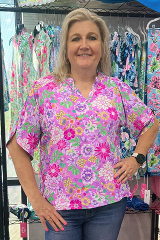 Your favorite Lizzy style, elevated. The Lizzy Breeze Blouse brings together the wrinkle-free fabric and relaxed fit you already love, now with a subtly flared sleeve that adds just the right touch of breezy elegance for any occasion.