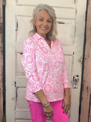 Elevate your everyday style with the Lulu-B 3/4 Sleeve Collar Top. Made from a breathable blend of 92% Nylon and 8% Spandex, this flattering knit top features a classic foldover polo collar and 3/4 sleeves for a polished yet relaxed look. Designed with a straight hemline and subtle 1-inch side slits for easy movement. Plus, it’s pre-shrunk and made with UPF50+ fabric—giving you superior sun protection without sacrificing comfort. Center back length: 26.5 inches.