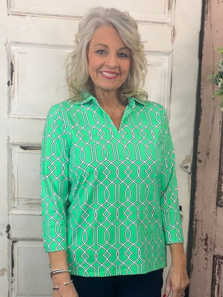 Elevate your everyday style with the Lulu-B 3/4 Sleeve Collar Top. Made from a breathable blend of 92% Nylon and 8% Spandex, this flattering knit top features a classic foldover polo collar and 3/4 sleeves for a polished yet relaxed look. Designed with a straight hemline and subtle 1-inch side slits for easy movement. Plus, it’s pre-shrunk and made with UPF50+ fabric—giving you superior sun protection without sacrificing comfort. Center back length: 26.5 inches.