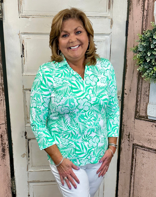 Lulu-B 3/4 sleeve collar top with UPF50+ sun protection, breathable nylon spandex fabric, foldover polo collar, straight hemline with side slits, 26.5-inch back length, comfortable and polished everyday top.