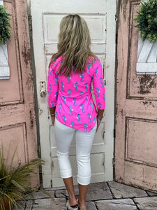 Lulu-B Asymmetrical Top in Seahorse Hot Pink with UPF 50 fabric, scoop neckline, 3/4 sleeves, and a stylish asymmetrical hemline. Comfortable & pre-shrunk.