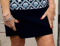 The Lulu-B Bangladine Skort is the perfect blend of sporty comfort and polished style. Crafted from Lulu-B’s signature bangladine fabric, this skort offers a smooth, structured feel with just the right amount of stretch. Designed with built-in shorts for confident coverage and a flattering silhouette, it’s ideal for travel, everyday wear, or staying active while still looking put together. Easy to style and effortless to wear, this skort is a warm-weather essential.
