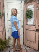 The Lulu-B Bangladine Skort is the perfect blend of sporty comfort and polished style. Crafted from Lulu-B’s signature bangladine fabric, this skort offers a smooth, structured feel with just the right amount of stretch. Designed with built-in shorts for confident coverage and a flattering silhouette, it’s ideal for travel, everyday wear, or staying active while still looking put together. Easy to style and effortless to wear, this skort is a warm-weather essential.
