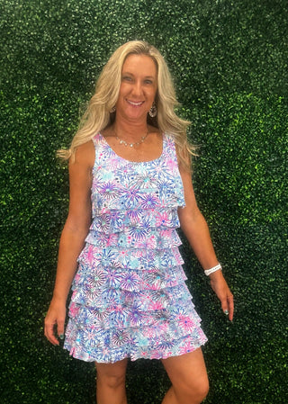 The Cha Cha Dress features front & back ruffles, UPF 50+ protection, and a stretchy 92% nylon blend. 30.5" length, machine washable. Flattering for all sizes.