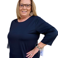Step up your wardrobe with this Asymmetrical Black Top, a perfect blend of style and comfort. Crafted from a stretch knit blend (92% Nylon, 8% Spandex), it features a scoop neckline, 3/4 sleeves, and an asymmetrical hemline for a modern, flattering silhouette. With UPF 50 sun protection and pre-shrunk fabric, it’s as practical as it is chic.