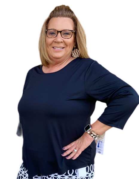 Step up your wardrobe with this Asymmetrical Black Top, a perfect blend of style and comfort. Crafted from a stretch knit blend (92% Nylon, 8% Spandex), it features a scoop neckline, 3/4 sleeves, and an asymmetrical hemline for a modern, flattering silhouette. With UPF 50 sun protection and pre-shrunk fabric, it’s as practical as it is chic.