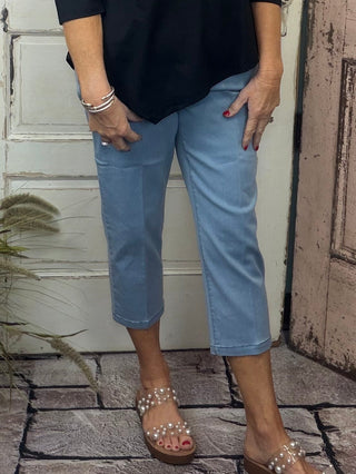 The Lulu-B Denim Capri is a timeless warm-weather staple designed for comfort, stretch, and everyday wear. Made with soft, flexible denim, these capris offer a flattering fit that moves with you while maintaining a polished look. Easy to dress up or down, they pair perfectly with tanks, tees, or lightweight tops for effortless spring and summer styling. Comfortable, versatile, and travel-friendly—these are capris you’ll reach for again and again.