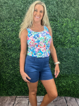 The Lulu-B Denim Pull-On Shorts are a warm-weather essential designed for comfort, ease, and polished style. Made from Lulu-B’s signature denim fabric, these shorts offer a smooth, structured feel with comfortable stretch. The pull-on waistband creates an easy, flattering fit, while subtle side vents add movement and a modern touch. Lightweight and travel-friendly, these shorts are perfect for everyday wear, vacations, and sunny days on the go.