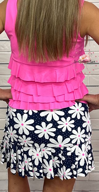 The Lulu-B Flounce Skort in the Daisy print features a bold black background with white daisies and hot pink centers — a fun, eye-catching print that pairs effortlessly with your favorite warm-weather tops. The single ruffle hem detail adds a flirty, flouncy finish that makes this skort anything but ordinary.