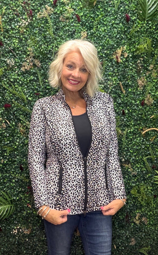 Print | Black leopard print
Collar | Mock neck style
Zipper | Two-way full-length zipper
Sleeves | Long sleeves
Pockets | Front pockets
Details | Contrast stitching at seams, slight high-low hemline
Length | 25" center back
Fabric | 92% Nylon / 8% Spandex — signature cooling blend