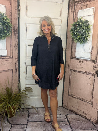 Bright, flattering, and effortlessly comfortable, the Lulu-B Half Zip Dress is a go-to for sunny days and casual-chic outings. Crafted from a textured performance fabric, this dress offers lightweight comfort with a polished look that doesn’t cling. The half-zip neckline adds sporty versatility, while the easy silhouette makes it perfect for everything from travel and errands to lunch dates and resort wear. Stylish yet practical, this Lulu-B favorite is one you’ll reach for again and again.