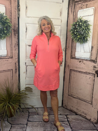 Bright, flattering, and effortlessly comfortable, the Lulu-B Half Zip Dress is a go-to for sunny days and casual-chic outings. Crafted from a textured performance fabric, this dress offers lightweight comfort with a polished look that doesn’t cling. The half-zip neckline adds sporty versatility, while the easy silhouette makes it perfect for everything from travel and errands to lunch dates and resort wear. Stylish yet practical, this Lulu-B favorite is one you’ll reach for again and again.