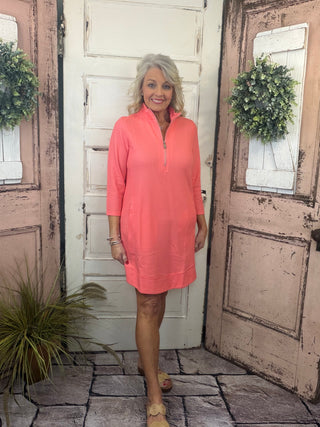 Bright, flattering, and effortlessly comfortable, the Lulu-B Half Zip Dress is a go-to for sunny days and casual-chic outings. Crafted from a textured performance fabric, this dress offers lightweight comfort with a polished look that doesn’t cling. The half-zip neckline adds sporty versatility, while the easy silhouette makes it perfect for everything from travel and errands to lunch dates and resort wear. Stylish yet practical, this Lulu-B favorite is one you’ll reach for again and again.