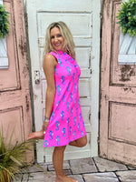Lulu-B Ruffle V-Neck Dress in Hot Pink Seahorse with a ruffle neckline, UPF50+ sun protection, and a lightweight, stretchy fabric for all-day comfort.
