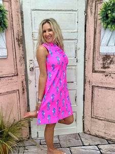 Lulu-B Ruffle V-Neck Dress in Hot Pink Seahorse with a ruffle neckline, UPF50+ sun protection, and a lightweight, stretchy fabric for all-day comfort.