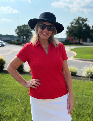 Shop the Lulu B Short Sleeve V-Neck Top with Collar. Butter-soft, wrinkle-free fabric with UPF 50+ sun protection — perfect for travel and everyday elegance.