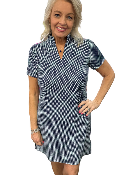 Stay cool, stylish, and protected with this must-have pullover dress. Crafted from a breathable 92% Nylon / 8% Spandex blend, it offers a flattering fit with just the right amount of stretch. The short sleeves and V-neckline with a smart collar create a polished yet relaxed look, perfect for everything from brunch to beach walks.