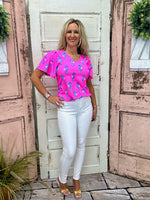 Lulu-B Short Sleeve V-Neck Frill Top in Seahorse Hot Pink with SPF 50 fabric, breathable comfort, and frill details for a stylish, sun-safe look.
