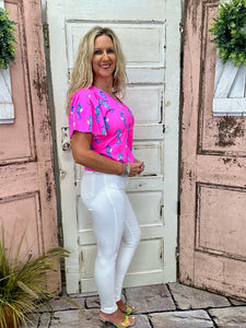 Lulu-B Short Sleeve V-Neck Frill Top in Seahorse Hot Pink with SPF 50 fabric, breathable comfort, and frill details for a stylish, sun-safe look.
