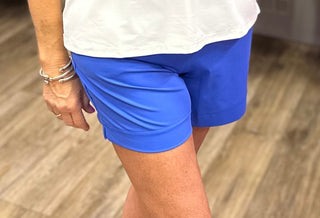  The Lulu-B Shorts in Deep Sea are crafted from lightweight, breathable SPX fabric in a deep, saturated blue hue — superior moisture-wicking, stretch, and UPF sun protection keep you cool and confident whether you're on the go, enjoying the outdoors, or simply relaxing. That rich Deep Sea colorway pairs beautifully with white, navy, and neutral tops for a polished, coastal-inspired look all season long.