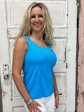 Lulu-B Sleeveless Tank in Turquoise, featuring a soft, stretchy nylon-spandex blend, a classic tank neckline, straight hemline, and breathable, easy-care fabric.