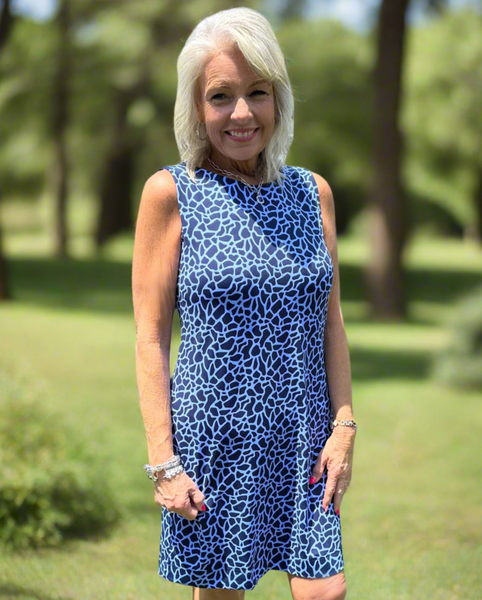 Timeless and travel-ready! Our Classic Scoop Neck Dress offers soft, stretchy comfort with UPF50 sun protection. The flattering scoop neck and 34.5